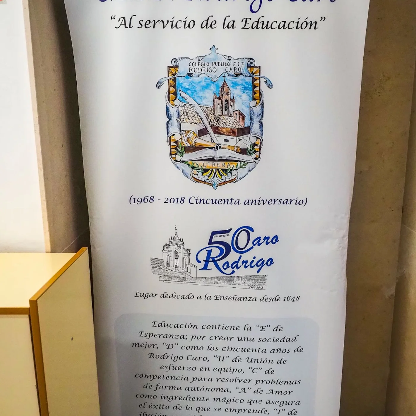 Cartel del cincuenta aniversario del CEIP Rodrigo Caro